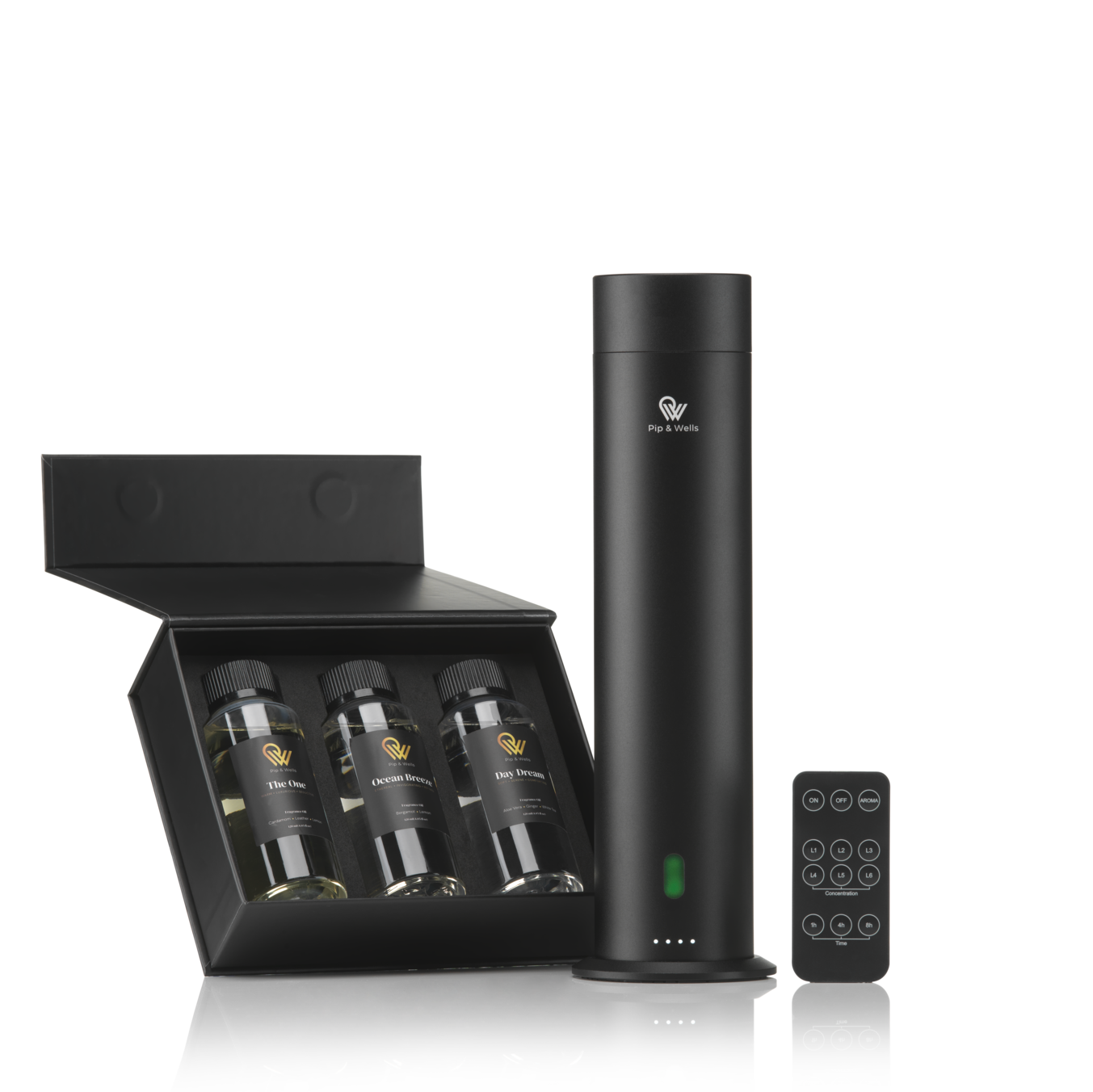 Pip & Wells Pure One matte black waterless aroma diffuser with remote control and three fragrance oils in a gift box