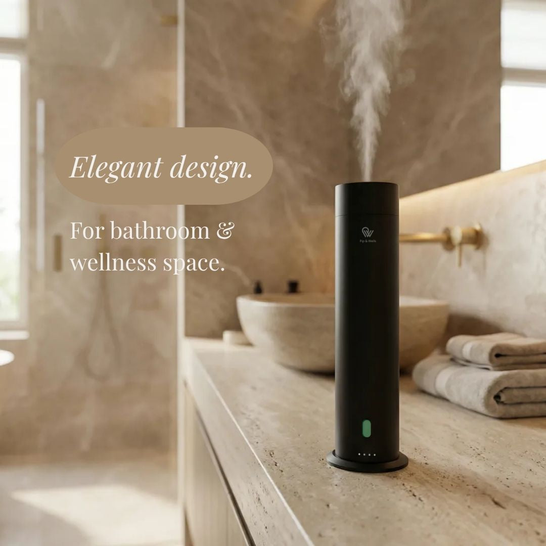 Pip & Wells Pure One matte black waterless aroma diffuser on a bathroom counter